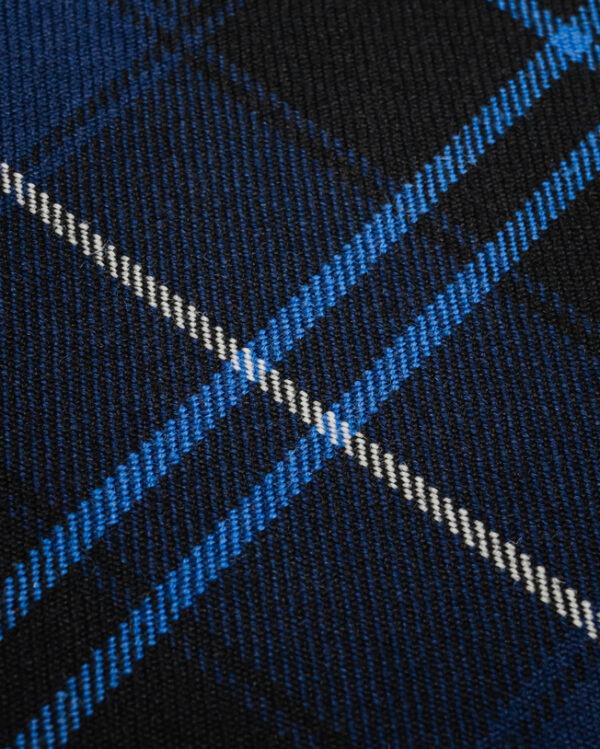 Tartan dark blue with blue & white stripes.