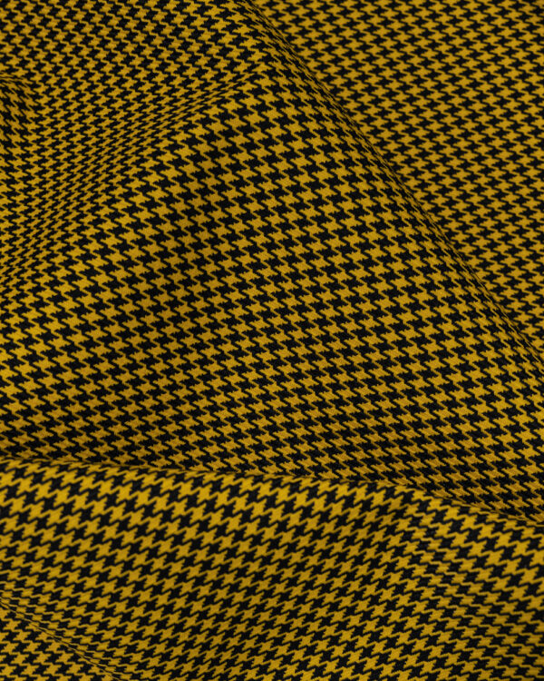 Houndstooth black and yellow fabric. Content: 100% Polyester.