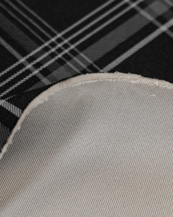 Tartan black and gray fabric. Originally used in the Volkswagen Golf MK7 models like GTI, GTE and GTD.