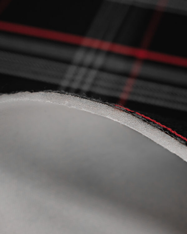 Tartan black, gray with red stripes fabric. Originally used in the Volkswagen Golf MK7 models like GTI, GTE and GTD.