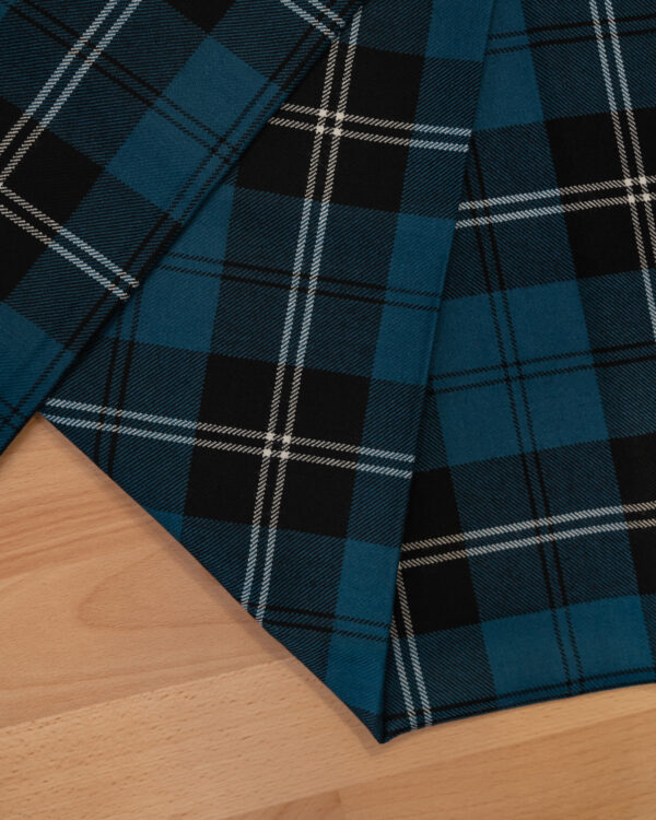Tartan blue & black with white & black stripes.
