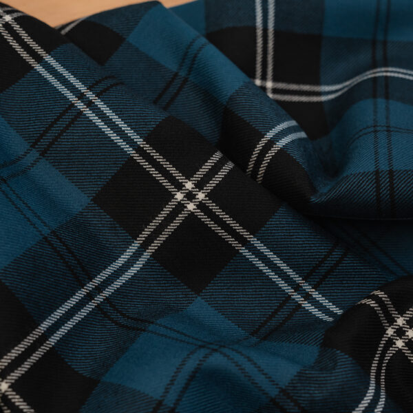 Tartan blue & black with white & black stripes.
