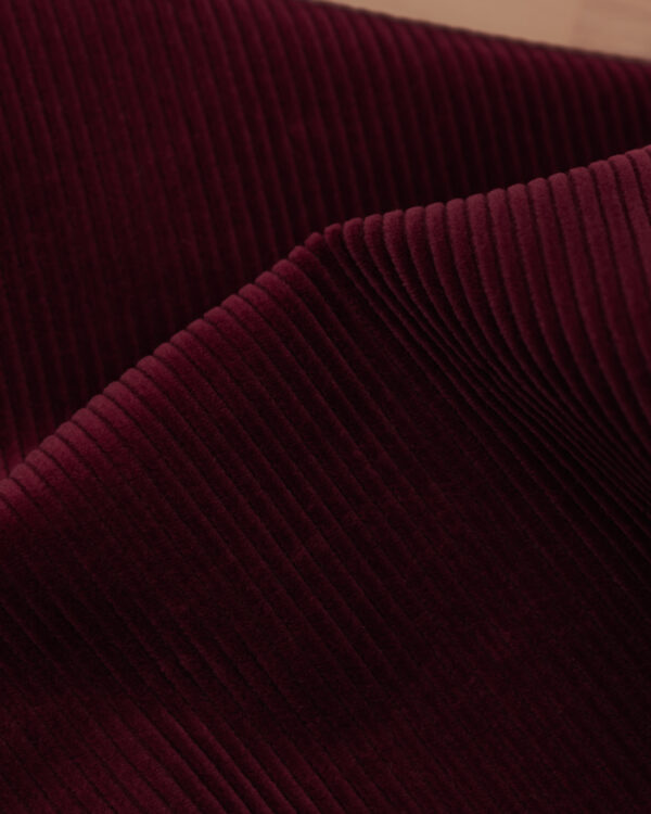 Kordsamt / Corduroy / Cord / Cord velvet coarse fabric in red.