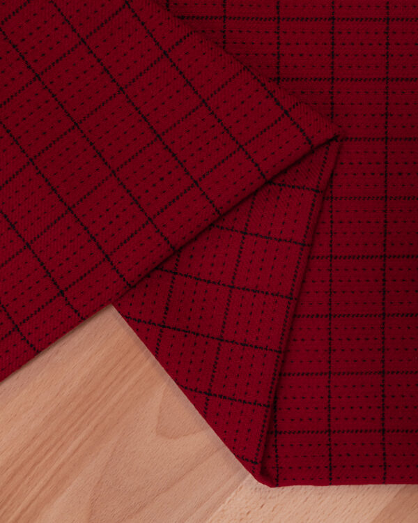 Red with black square stripes fabric.
