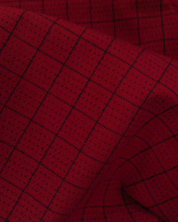 Red with black square stripes fabric.