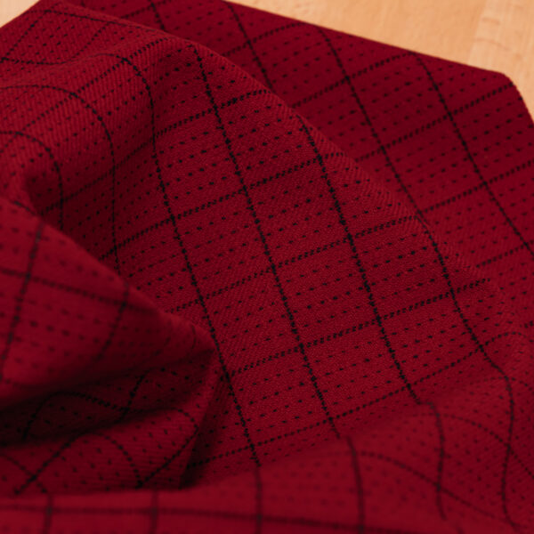 Red with black square stripes fabric.