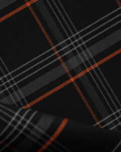 Tartan black & gray fabric with orange stripes. Originally used in the Volkswagen Golf MK7 models like GTI, GTE and GTD.
