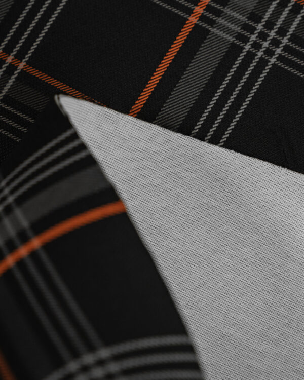 Tartan black & gray fabric with orange stripes. Originally used in the Volkswagen Golf MK7 models like GTI, GTE and GTD.